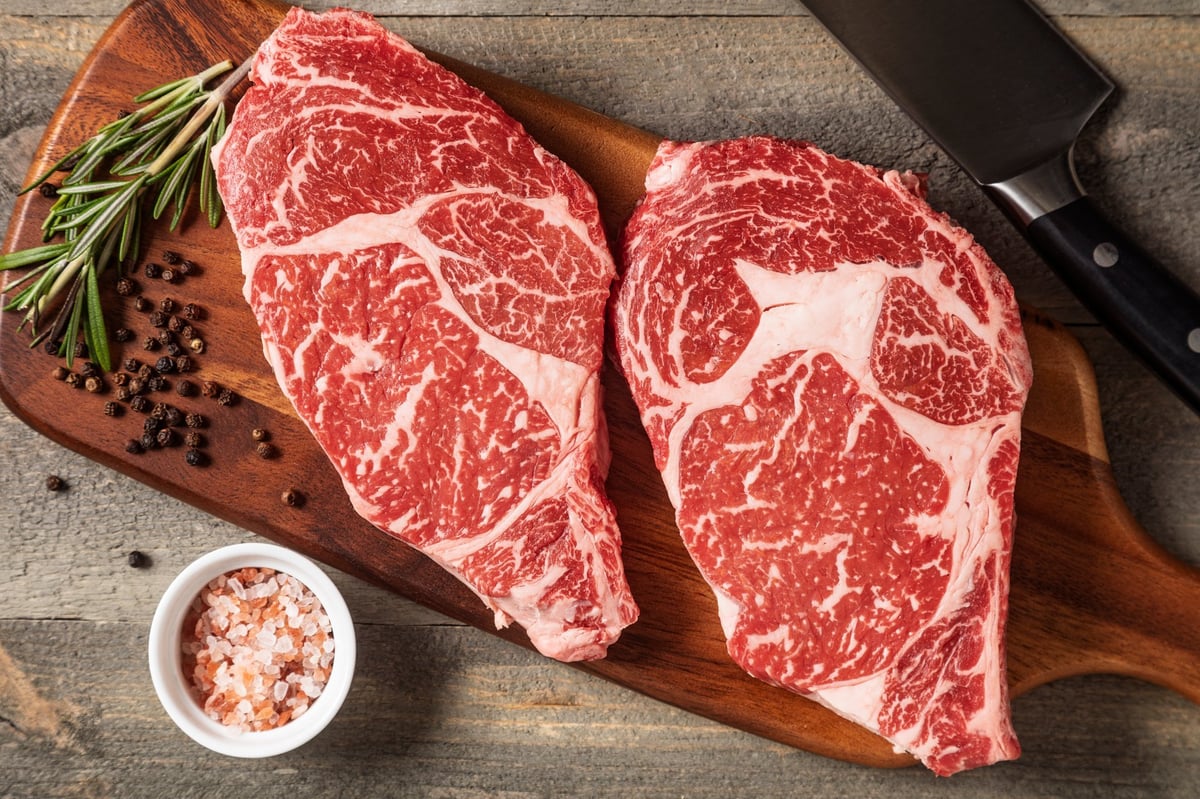 Premium marbled steaks prepped for cooking